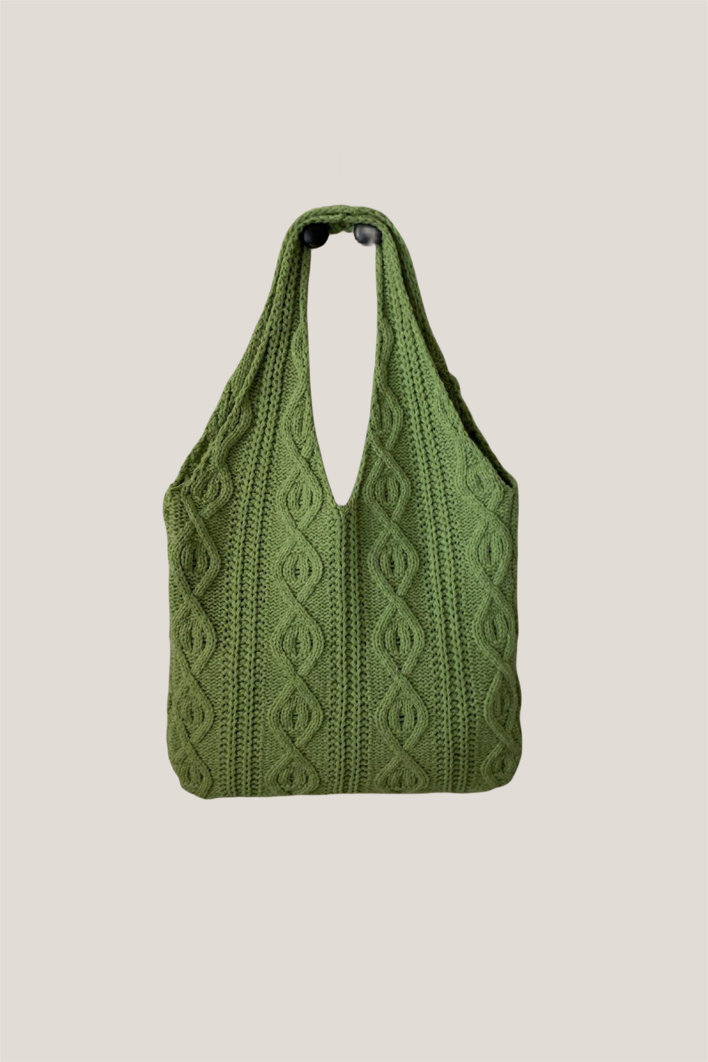 Bolsa de mano trenzada con estampado de corazones