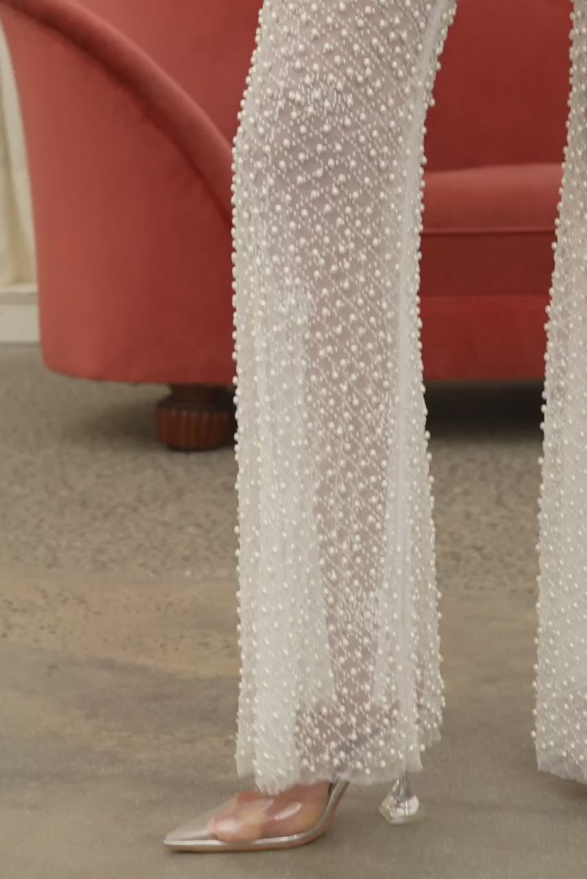 Pantalones de malla con lentejuelas y cuentas