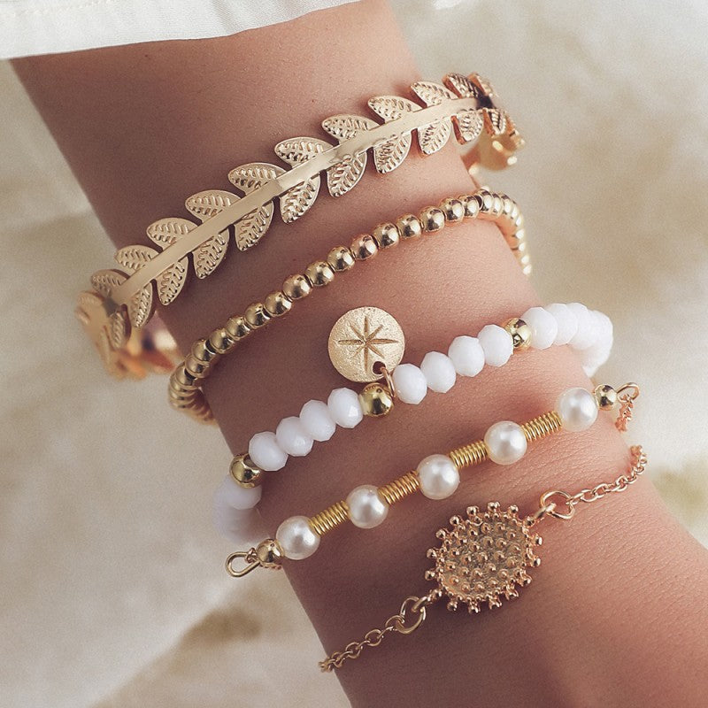 Conjunto de cinco pulseras vintage de perlas macizas para el día a día