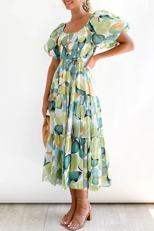 Vestido elegante y dulce con estampado asimétrico y hombros descubiertos.