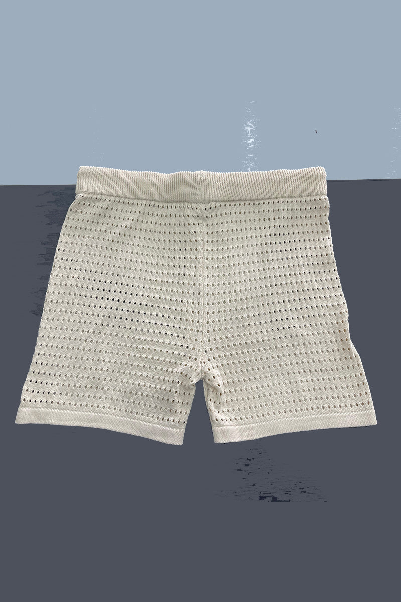 Conjunto informal de dos piezas con cuello vuelto, media manga y abertura en un solo color