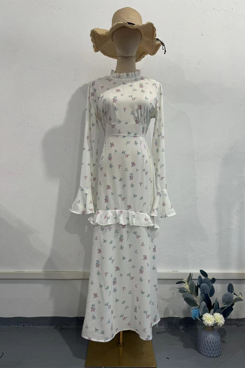 Elegante vestido de manga larga con cuello alto, volantes y patchwork con estampado de flores