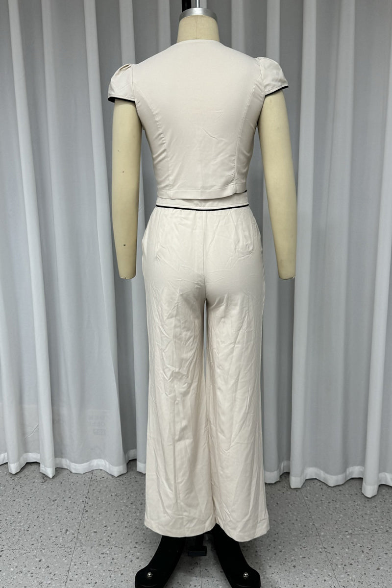 Conjunto informal de dos piezas con cuello en V, manga corta, botones y bolsillos de color liso