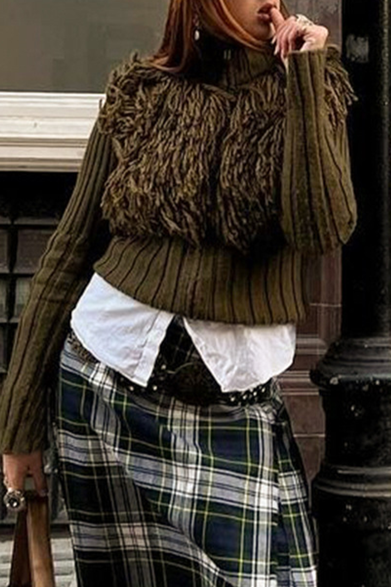 Suéteres casuales de cuello alto con cremallera y ribete de flecos de color liso