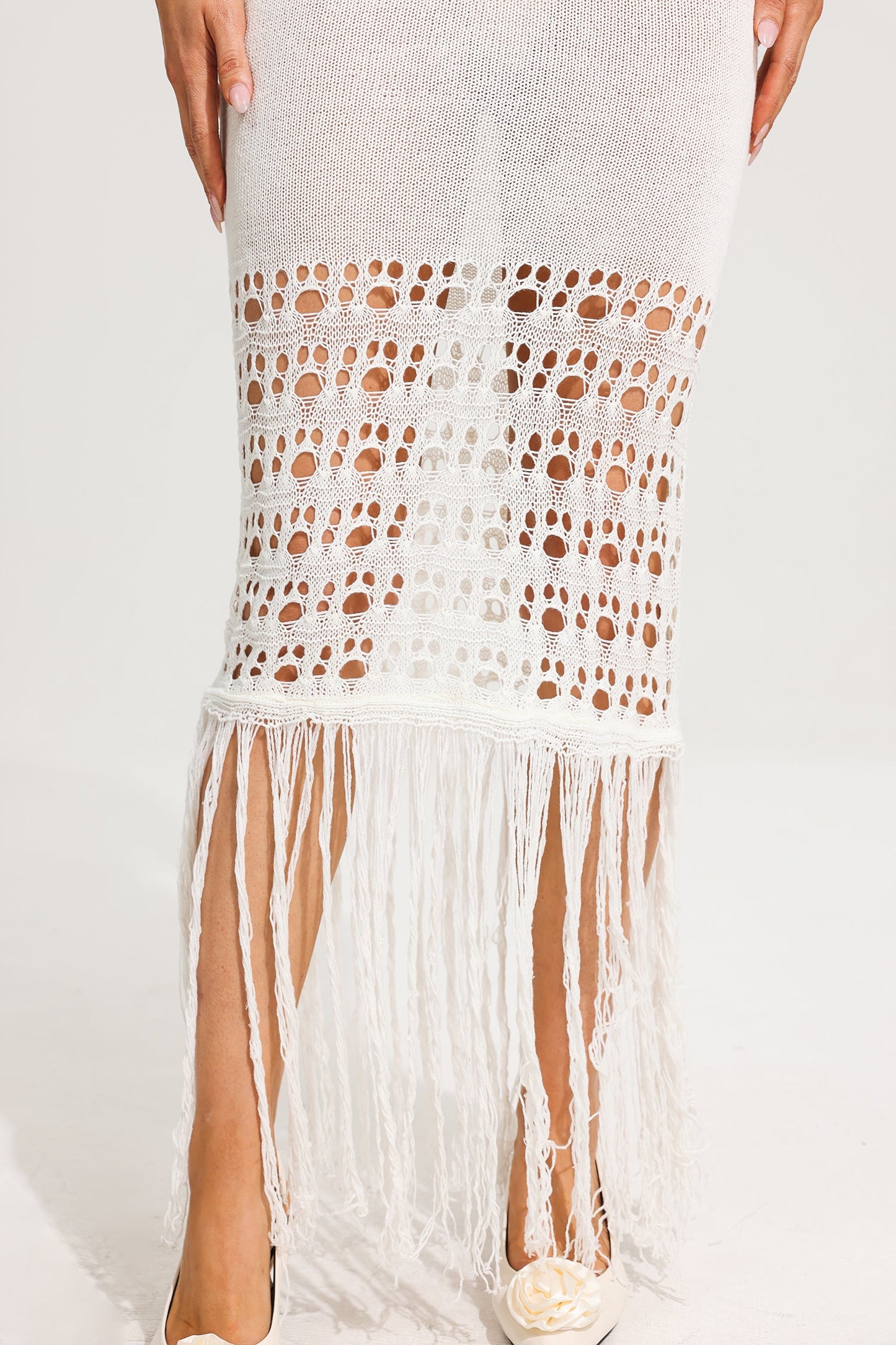 Vestido largo sin tirantes con aberturas de punto