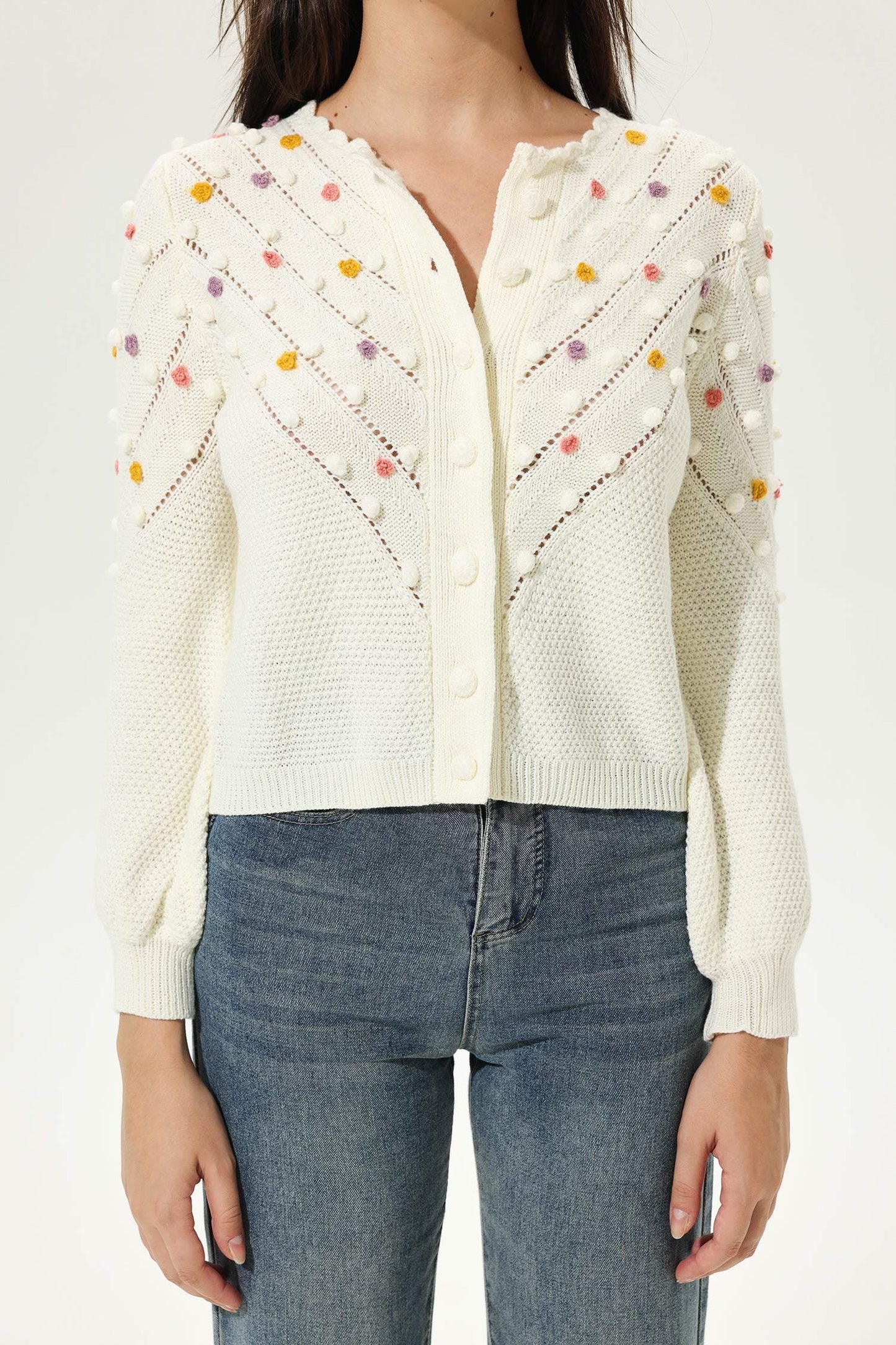 Cárdigan de punto de cuello redondo y manga larga en beige