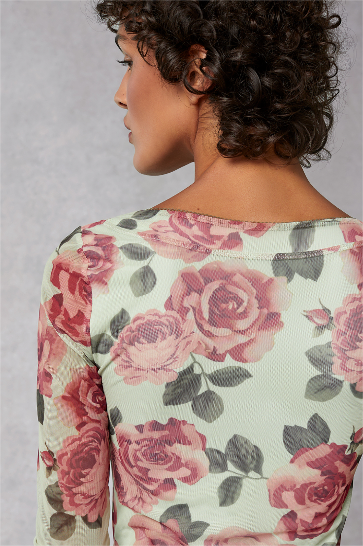 Vestido midi floral de manga larga y cuello redondo