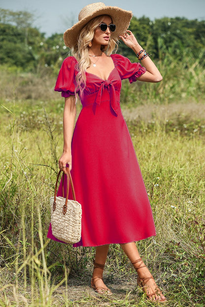 Vestido midi rojo con lazo y mangas abullonadas 