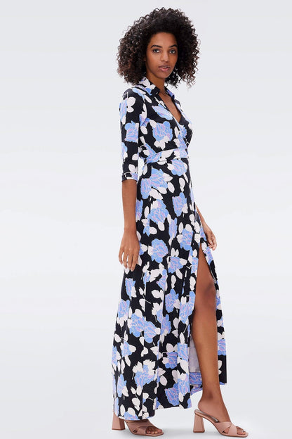 Vestido largo cruzado con encaje y mangas a media pierna con estampado floral 