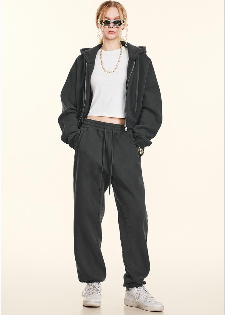 Conjunto deportivo de dos piezas de marca con abrigo corto y cremallera de otoño para hombre y mujer.