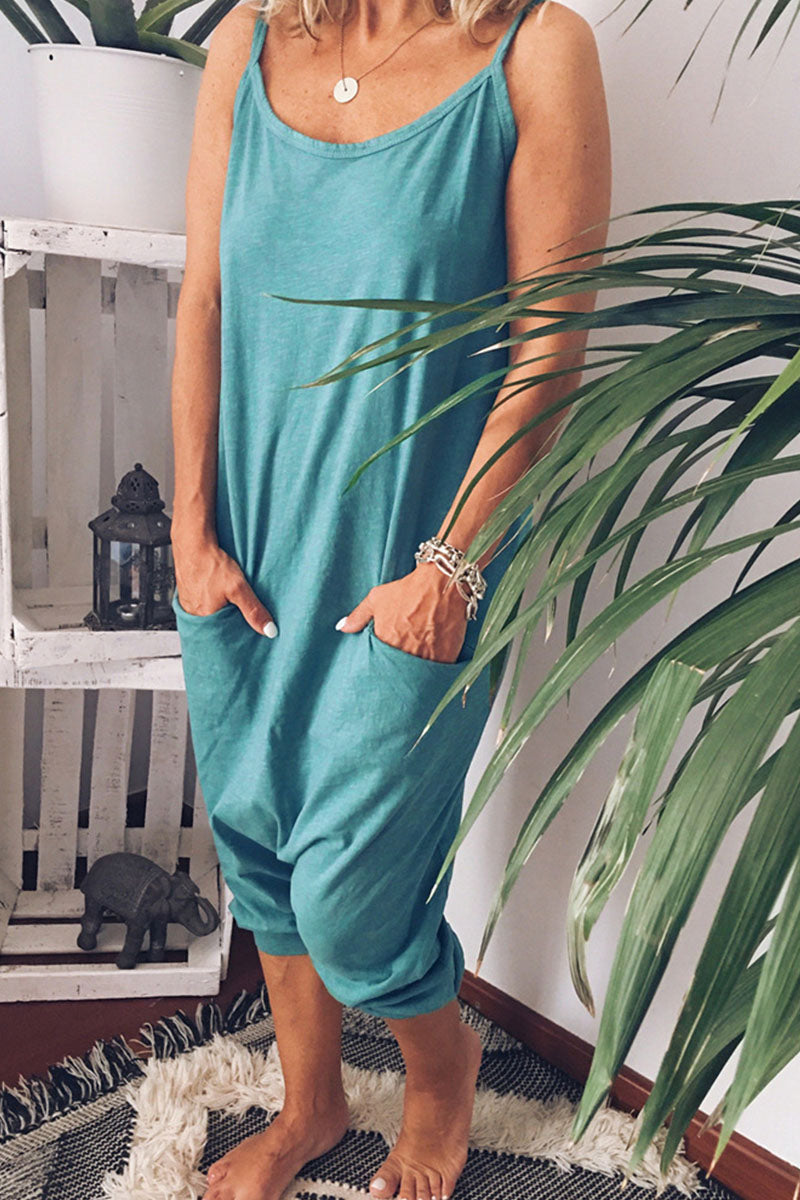 Mono holgado informal de moda con bolsillos sólidos y tirantes finos