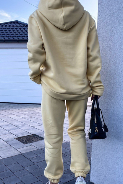 Conjunto deportivo de dos piezas con capucha, cuello alto, manga larga y bolsillos laterales divididos (4 colores)