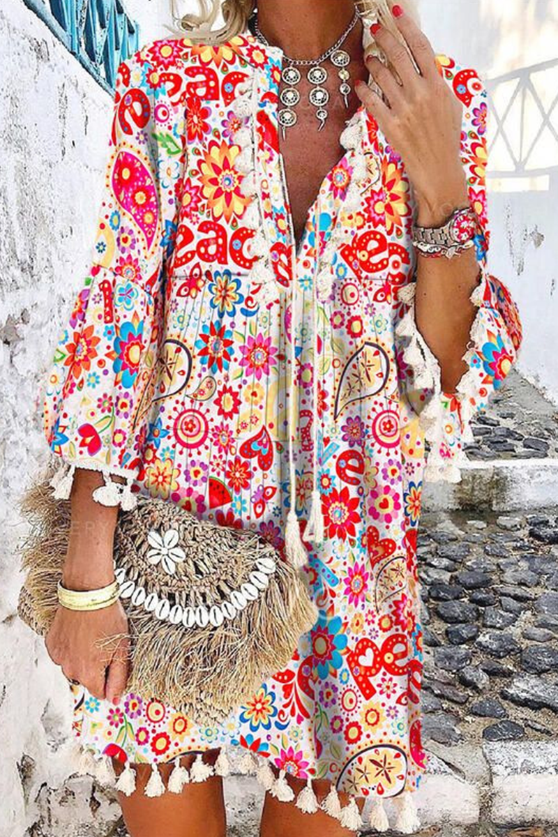 Vestidos casuales con estampado de borlas y cuello en V con falda pastel