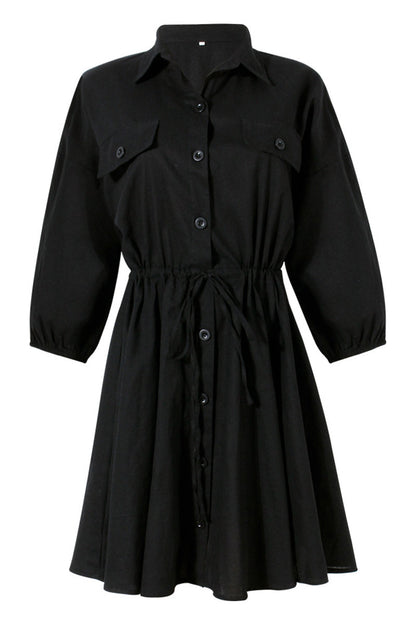 Elegante vestido de manga larga con cuello vuelto, bolsillos y frenillo liso