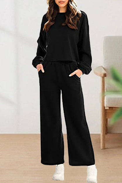 Conjunto informal de dos piezas con cuello redondo, manga larga y color liso