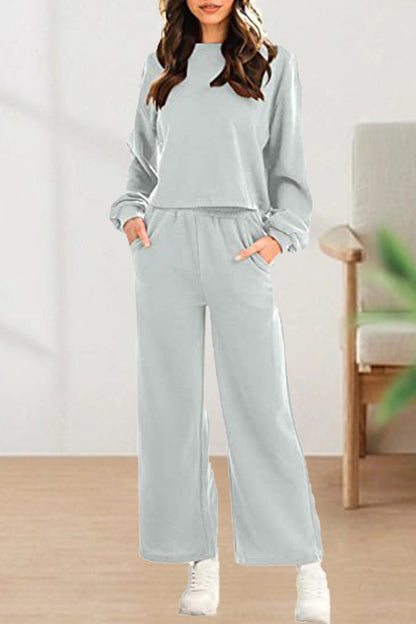 Conjunto informal de dos piezas con cuello redondo, manga larga y color liso