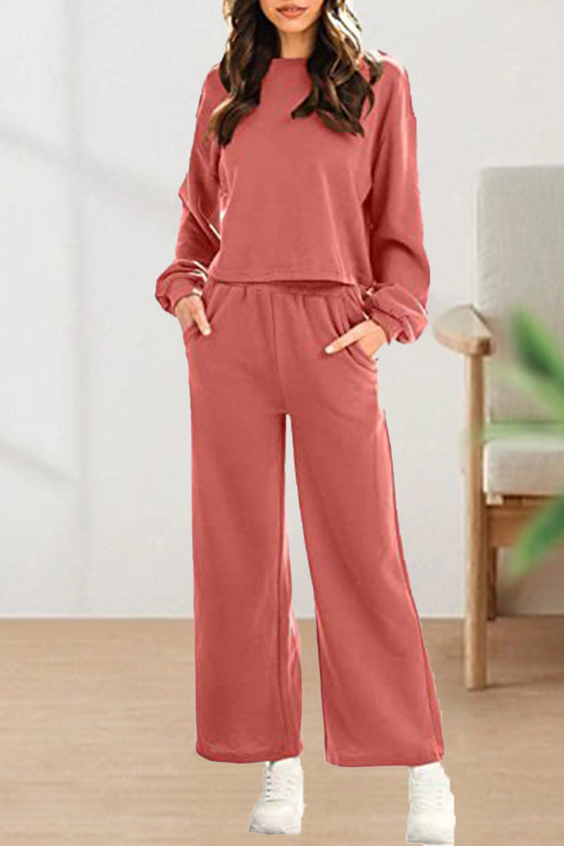 Conjunto informal de dos piezas con cuello redondo, manga larga y color liso