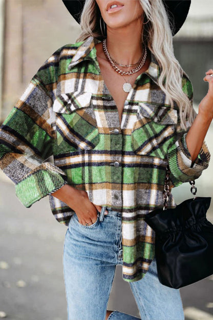 Elegante blusa con cuello vuelto y estampado a cuadros