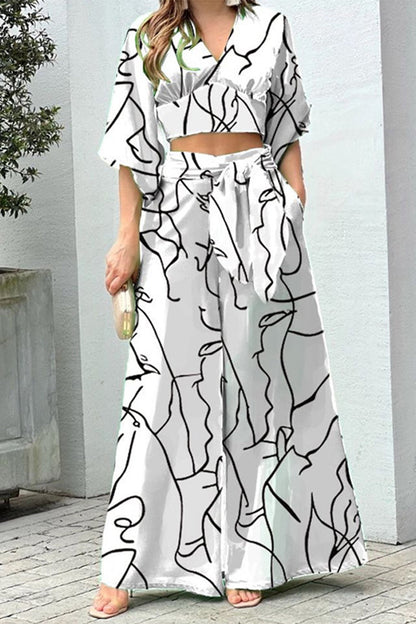 Conjunto de dos piezas con cuello en V, manga corta y estampado elegante (10 colores)