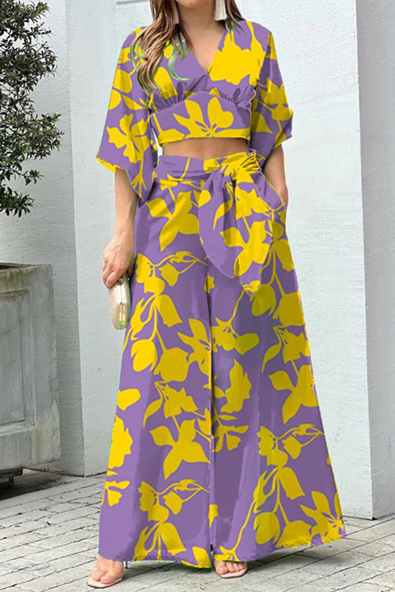 Conjunto de dos piezas con cuello en V, manga corta y estampado elegante (10 colores)