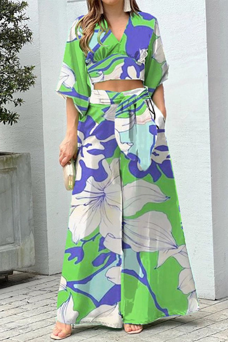 Conjunto de dos piezas con cuello en V, manga corta y estampado elegante (10 colores)