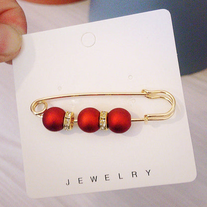 Broche de patchwork con bloques de colores dulces