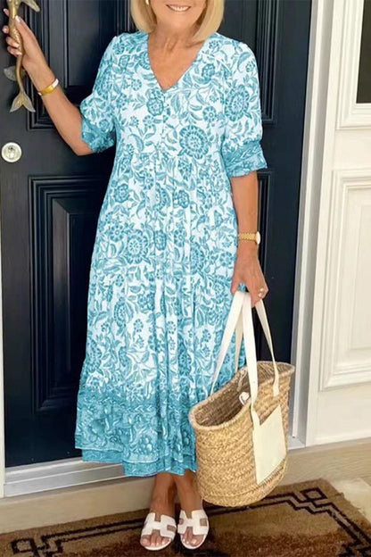 Elegante vestido de vacaciones con cuello en V, estampado tie-dye y patchwork.