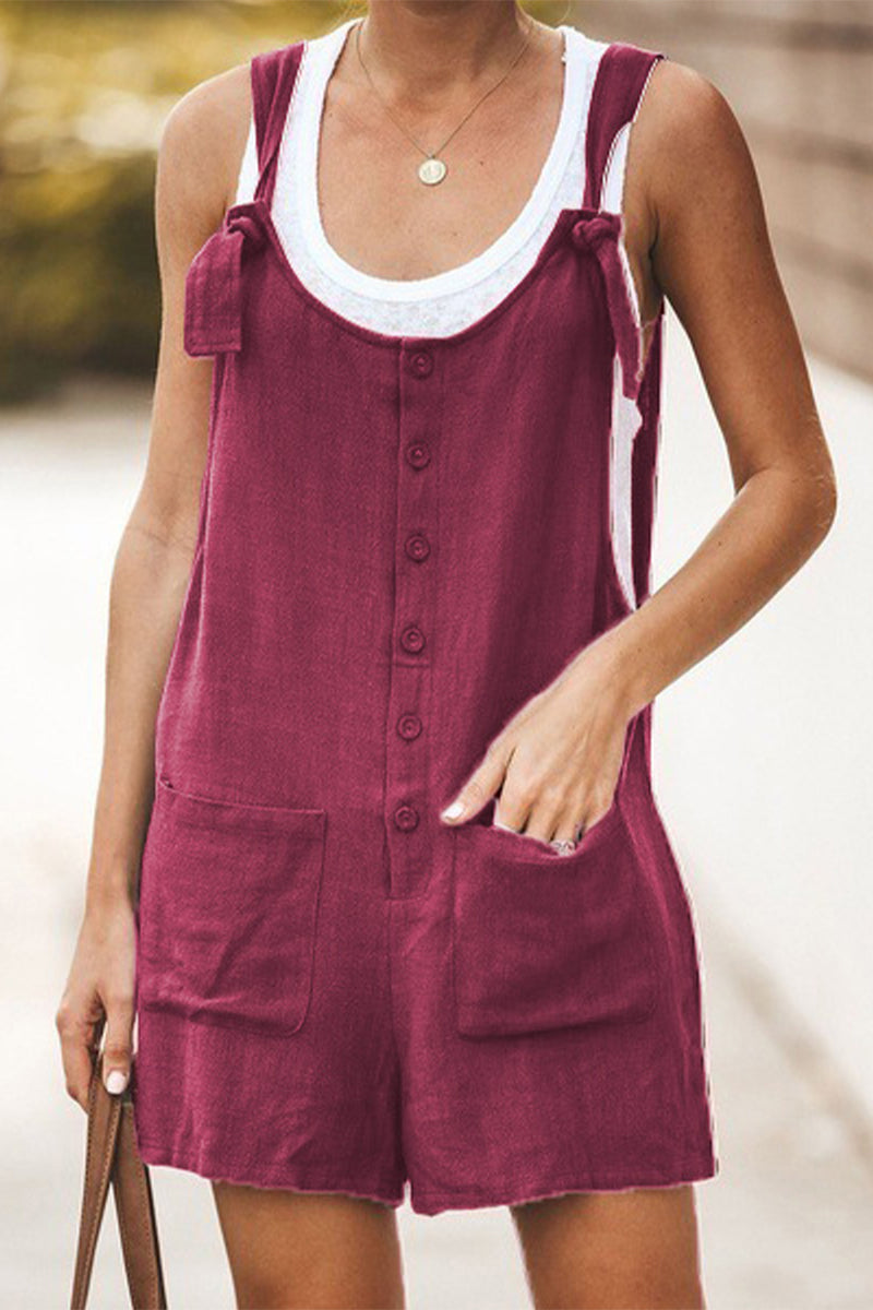 Mono holgado informal de uso diario con botones y bolsillos lisos y cuello en U