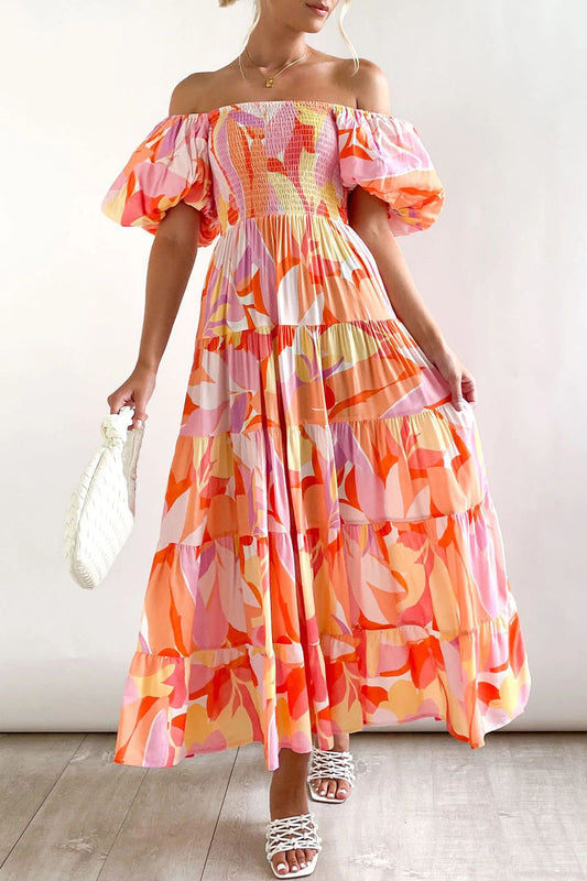 Vestido elegante y dulce con estampado asimétrico y hombros descubiertos.