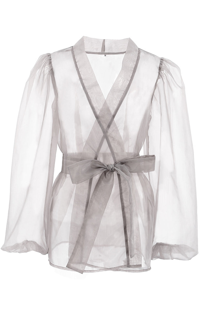 Elegante blusa lisa con cuello en V transparente y frenillo