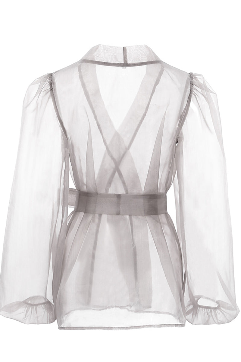 Elegante blusa lisa con cuello en V transparente y frenillo