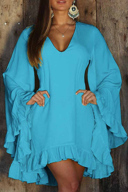 Vestido sexy de cuello en V irregular con volantes sólidos