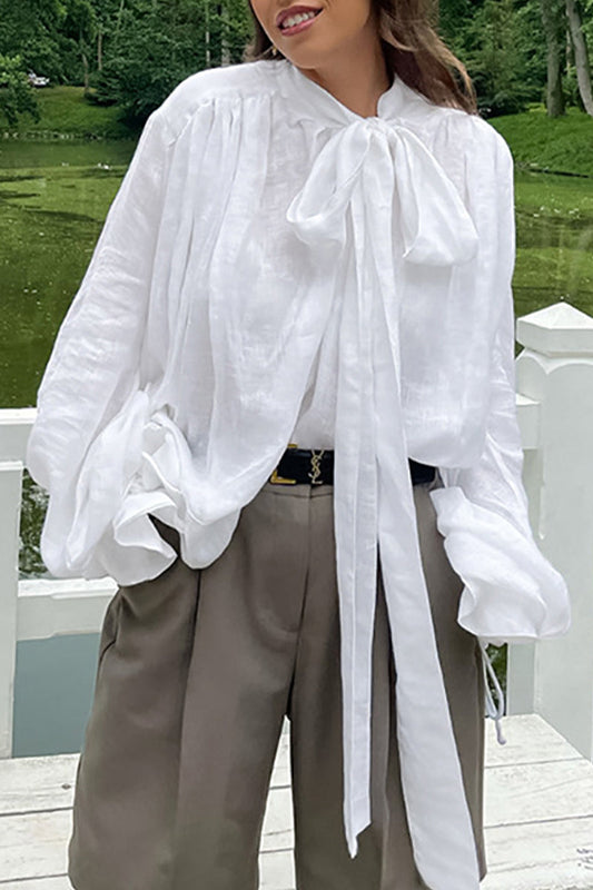Blusa elegante de estilo británico con cuello de lazo y cinta lisa