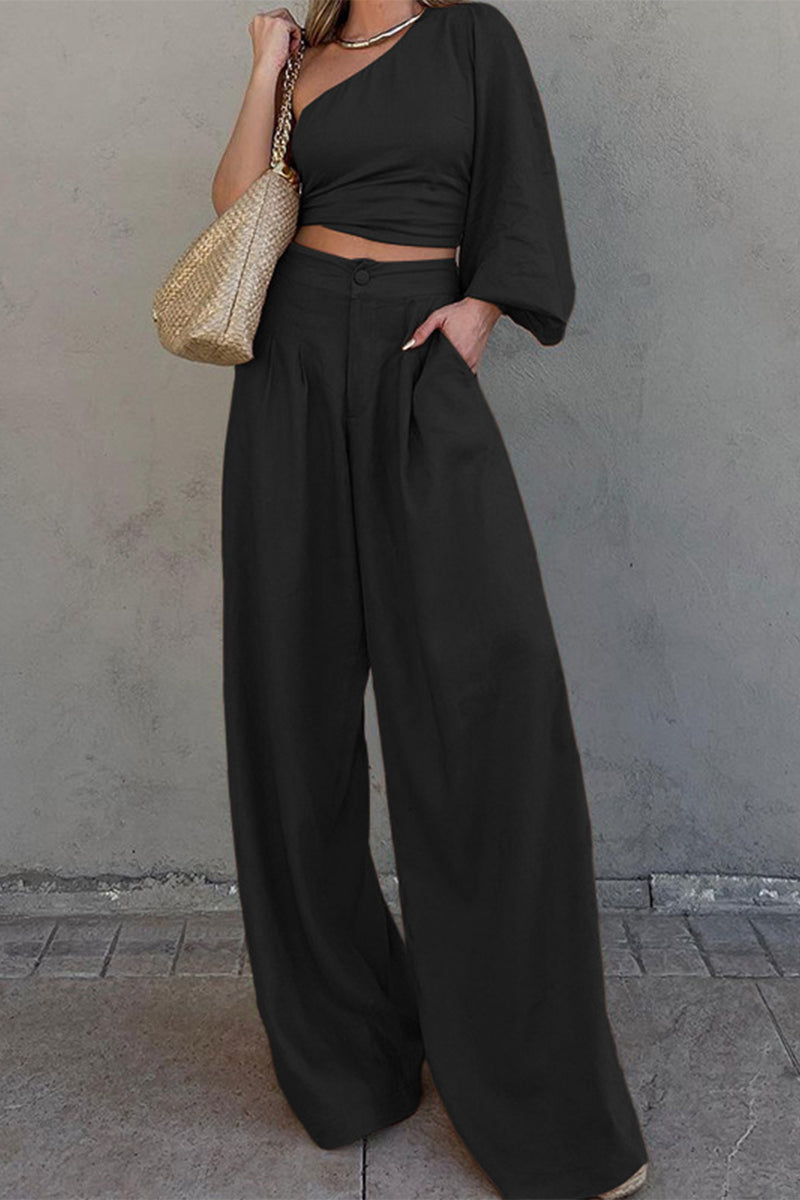 Elegante conjunto de dos piezas con cuello oblicuo, manga larga y bolsillo tipo vendaje liso