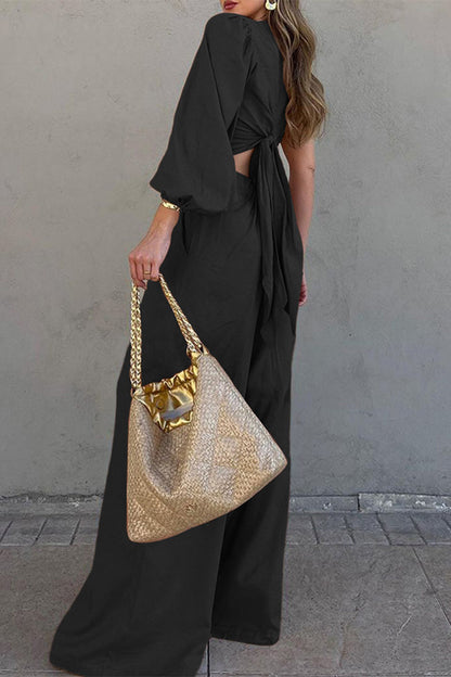 Elegante conjunto de dos piezas con cuello oblicuo, manga larga y bolsillo tipo vendaje liso