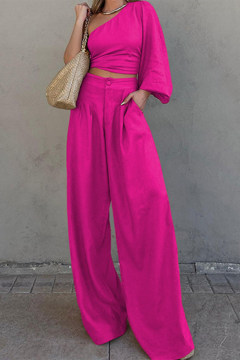 Elegante conjunto de dos piezas con cuello oblicuo, manga larga y bolsillo tipo vendaje liso