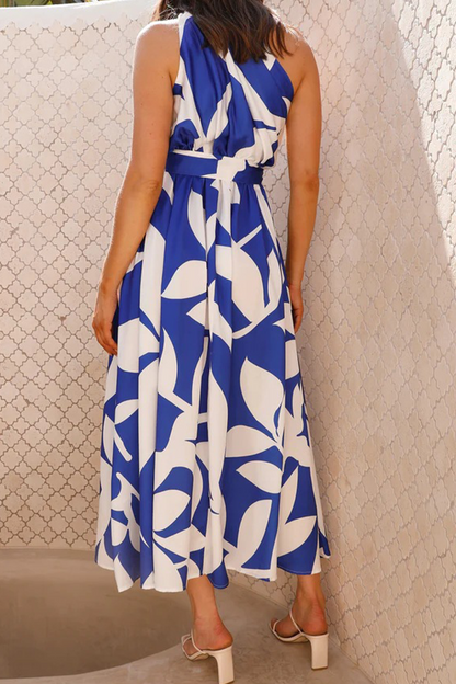 Vestidos sexis con falda y cintura oblicua con cuello y espalda descubierta y flores