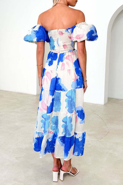 Vestido elegante y dulce con estampado floral, hombros descubiertos y aberturas.