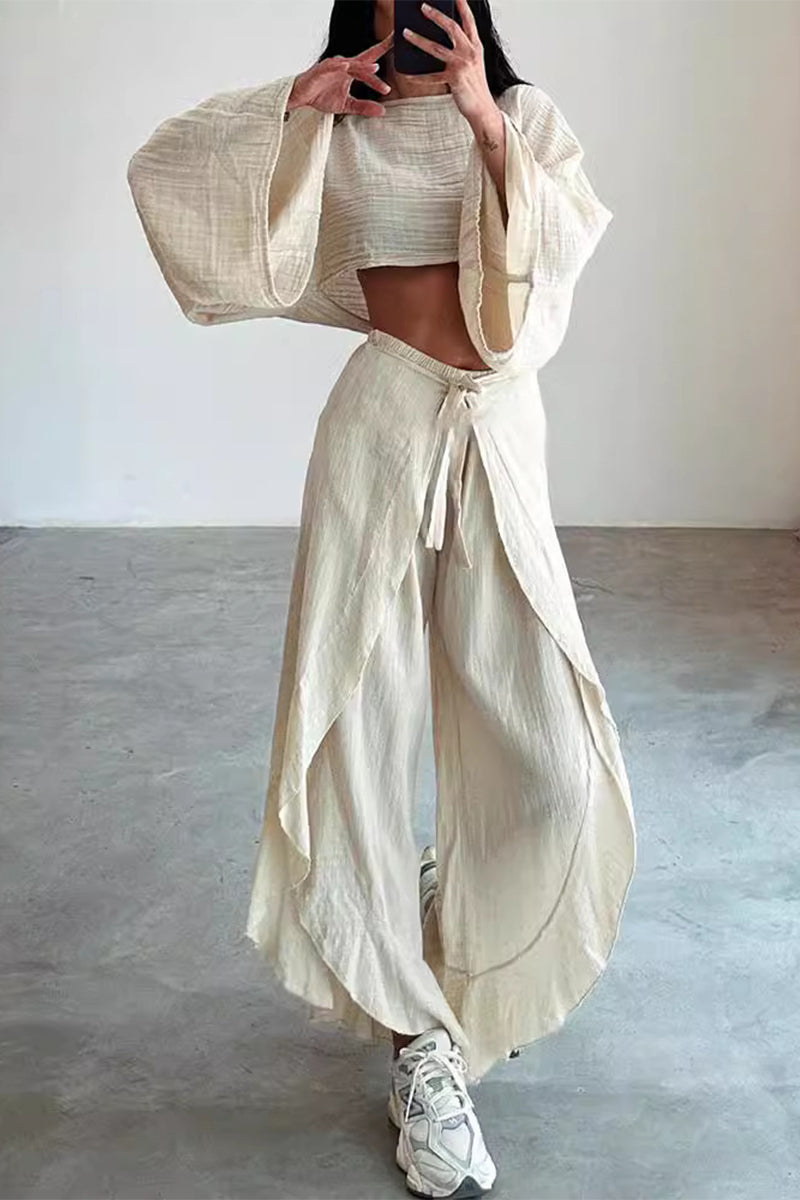 Conjunto informal de dos piezas con cuello redondo, manga larga, volante, frenillo liso y abertura