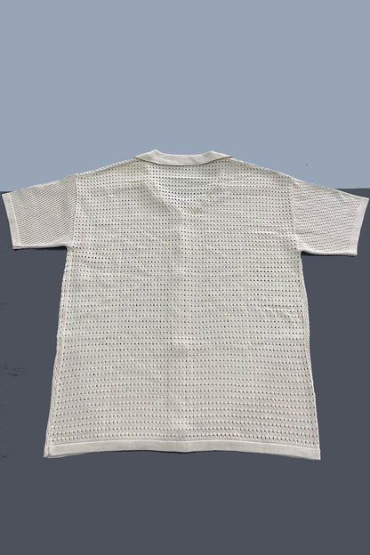 Conjunto informal de dos piezas con cuello vuelto, media manga y abertura en un solo color