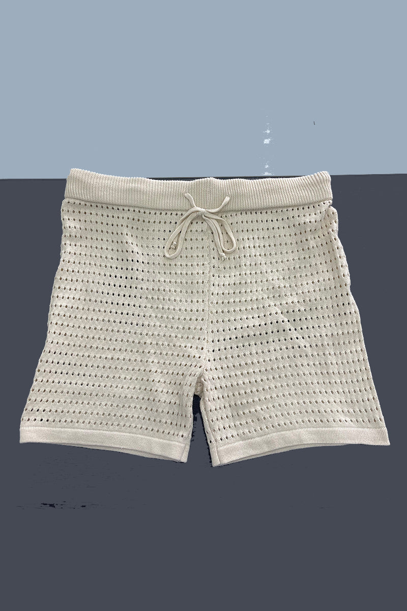 Conjunto informal de dos piezas con cuello vuelto, media manga y abertura en un solo color