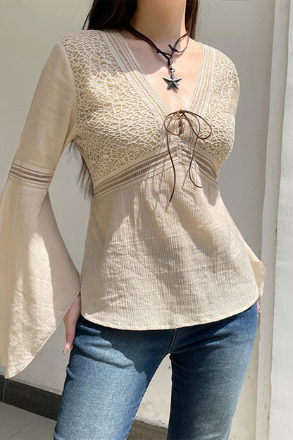 Elegante blusa de cuello en V con frenillo y patchwork sólido