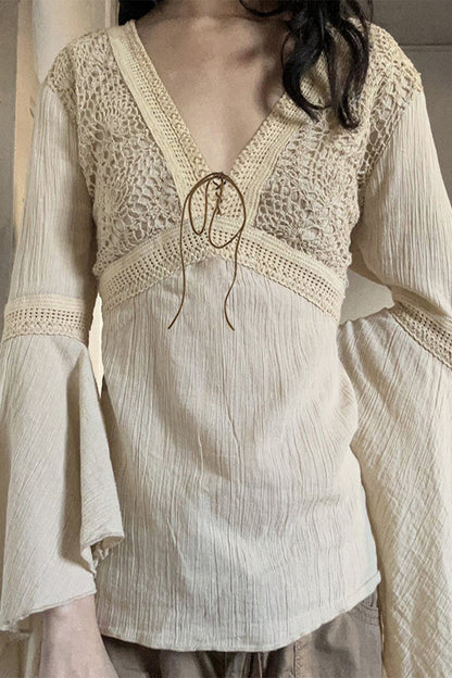 Elegante blusa de cuello en V con frenillo y patchwork sólido