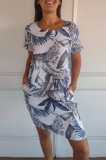 Vestidos casuales estampados con cuello redondo y bolsillos florales