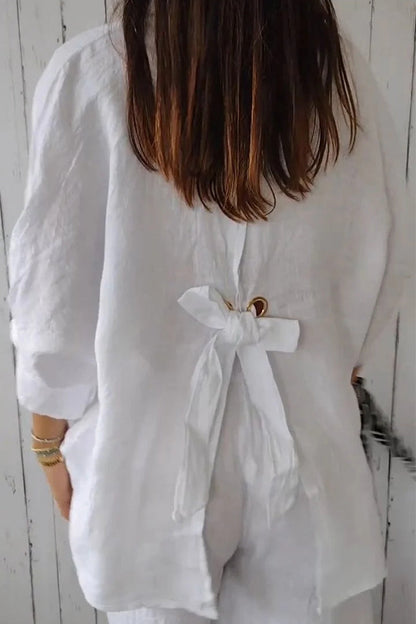 Blusa elegante con cuello vuelto, abertura y botones de frenillo liso (7 colores)