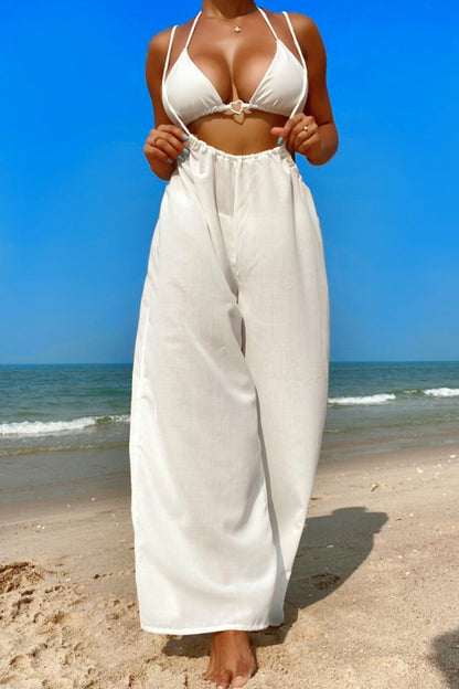 Monos sexis lisos con espalda descubierta y tirantes finos