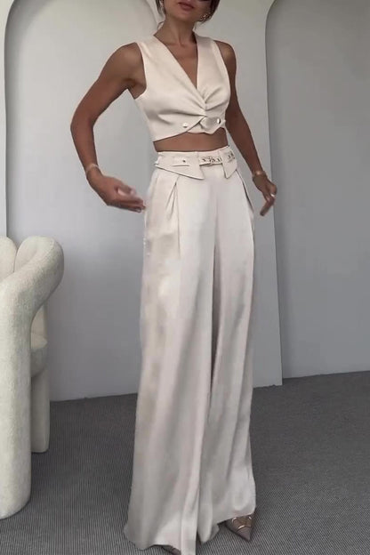 Conjunto informal de dos piezas sin mangas con cuello en V y bolsillos de color sólido