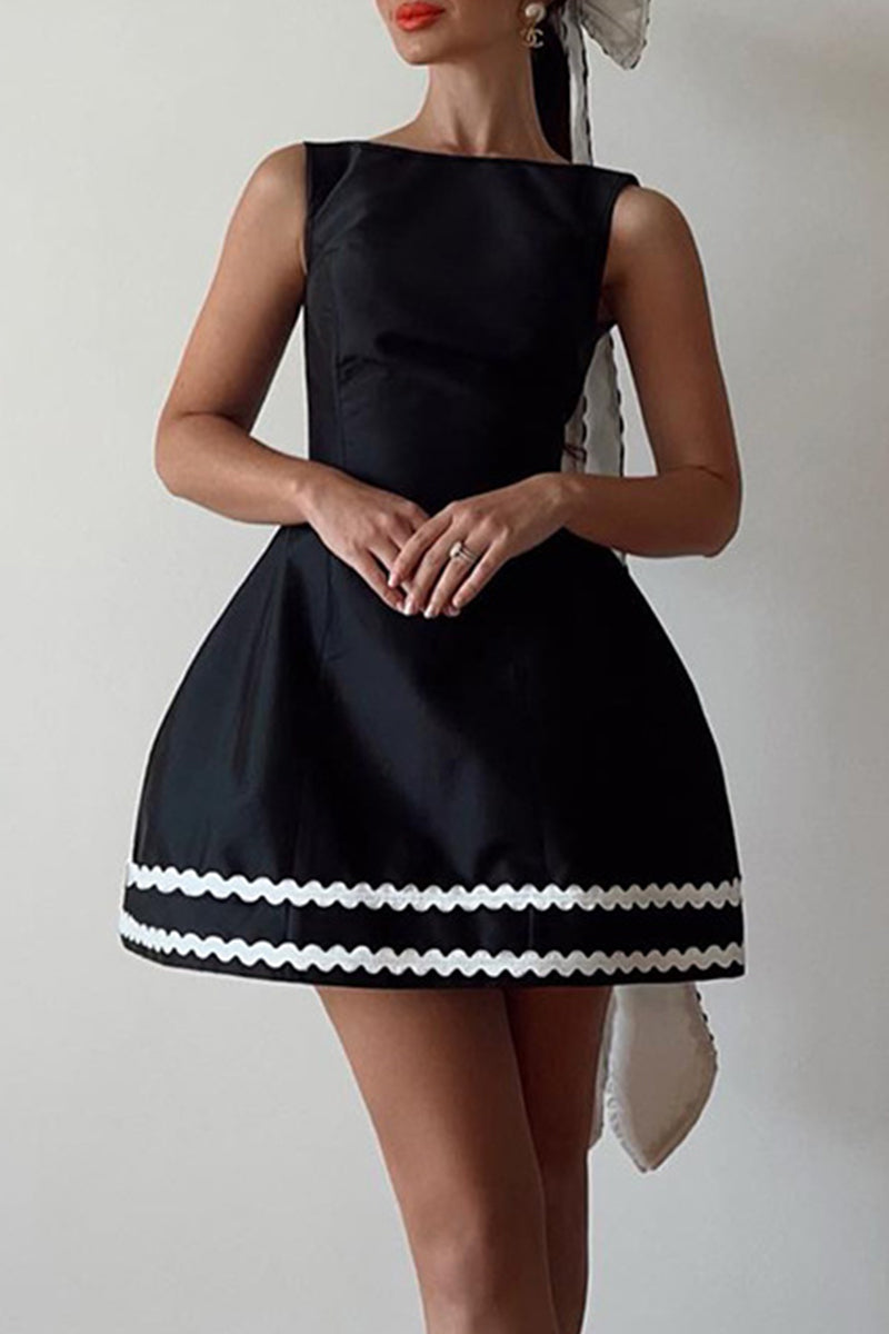 Vestidos sexis de celebridades con cuello redondo, espalda descubierta y patchwork en color liso