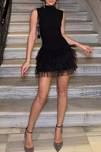 Vestidos de celebridades sexys de malla de color sólido con cuello mandarín y corte A