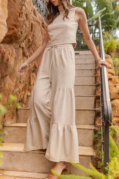 Conjunto informal de dos piezas con cuello alto, sin mangas, color sólido, con bolsillos y volantes